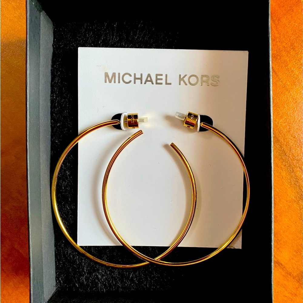 Michael Kors gold hoop earing